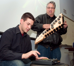 Students playing digital instruments